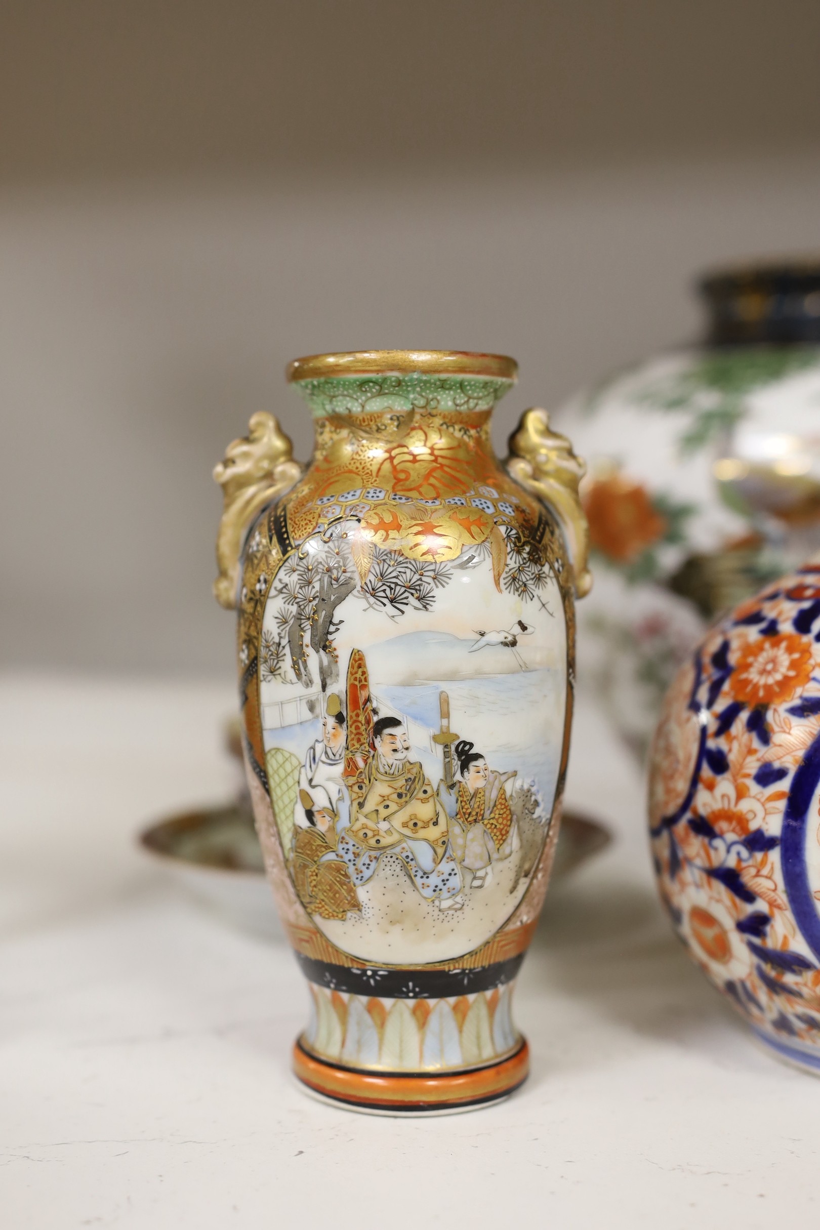Assorted Japanese ceramics including an Imari bottle vase, a Satsuma vase and Kutani eggshell porcelain